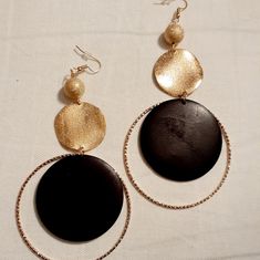 These Are Unique And Natural Natural Wood With Gold Metal Hoops And Accents They Hang 3 Inches These Are Very Lightweight On The Ear Easy To Wear They Are One Of A Kind These Earrings Are A Classic And Timeless Addition To Any Wardrobe Trendy Handmade Black Hoop Earrings, Adjustable Party Hoop Earrings, Hoop Dangle Earrings, Wooden Hoop, Hand Crafted Jewelry, Leather Projects, The Ear, Etsy Earrings Dangle, Jewelry Business