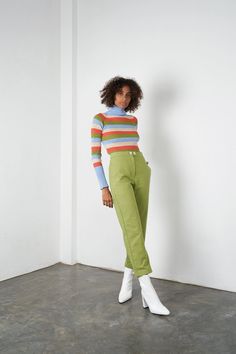 Racer Skivvy Sweater in Multi by Arthur. Clingy rib knit turtleneck sweater with raglan full sleeve in colorful thick stripe. Body hugging by design, this skivvy is made from a soft blend of cotton and spandex. Cotton / Spandex Rib Knit This garment is made to be snug. If you are in between sizes, you may choose to size up! Model wears a size 2. Hand wash cold and lay flat to dry or Dry Clean. Arthur Apparel, Knit Turtleneck, Womens Turtleneck, Knit Turtleneck Sweater, Women Long Sleeve Tops, Feminine Dress, Turtle Neck Top, Sweater Sale