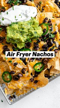 nachos with black beans, cheese and guacamole