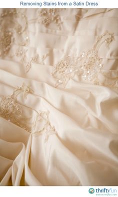 the back of a wedding dress with beading on it