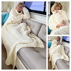 a woman laying on a couch covered in a white crochet blanket while holding a cell phone