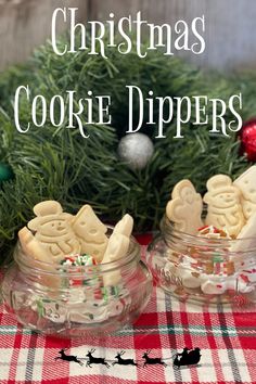 christmas cookie dippers in small glass jars on a table