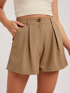 Woven bottom shorts with button and zipper closure - Pleat detail on front - Elastic band on center back with belt loop - Side pockets on the back - Finished with clean hem - Model is 5' 10" 33-24-35 and wearing a size Small Fabric: 96% polyester & 4% spandex **THIS ITEM IS A FINAL SALE ITEM. NO RETURNS OR EXCHANGES ALLOWED** Pleated Shorts, Wren, Elastic Band, Final Sale, Must Haves, Casual Shorts, Personal Style, Short Dresses, Size Small