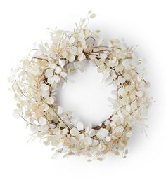 a wreath with white flowers and leaves