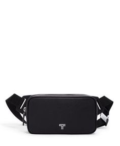 a black fanny bag with the letter t in white letters on it and an adjustable strap