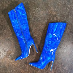 The Galaxy Boots are definitely a must have! The blue metallic is enough to light up any room! She is also available in Green! Take these beauties out with you and the girls; and evry-body will give you compliments! Heels: 4.5 inches Shaft: 16” Galaxy Boots, Thigh Boots, Stiletto Boots, Heels Boots, Chic Boutique, The Galaxy, High Heel, Heeled Boots, Light Up