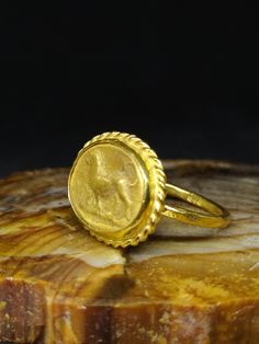 ARTSMYRNA METAL: 925k Silver GEM: Bronze Replica Coin COATING: 24k gold over (We can made a special type of coating for your personal preference ) MATERIEL : 925K Sterling Silver ( Some of my items vermeil gold over silver for looks rich . But i can finish in silver too ) PAYMENT : We accept paypal payment RING SIZE: 6 (your desired size is made) SPECIAL ORDER IS MADE. If you send us a photo of your desired model (you can send your gem.) We can do it for you. We can make any design you want with Heirloom 22k Gold Rings For Gift, 22k Gold Rings With Polished Finish Gift, Yellow Gold Rings Gift, Hallmarked 22k Gold Round Rings, 22k Gold Open Ring Gift, 22k Gold Open Ring As Gift, 22k Gold Open Ring For Gift, 22k Gold Round Engraved Ring Gift, 22k Gold Engraved Round Ring Gift