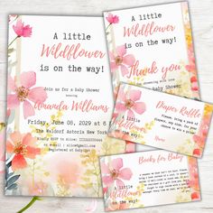 three watercolor flowers are shown on the front and back of this baby shower card