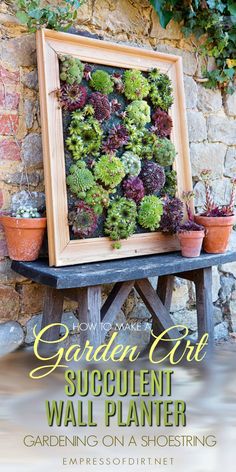 a garden art succulent wall planter sitting on top of a wooden bench