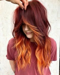 Red Hair With Different Color Bangs, 2023 Fashion Trends Hair, Auburn And Burgundy Hair, Red And Purple Pixie Hair, Color Bangstyle Hair, Fire Hair Color Ideas, Older Punk Women, Natural Red Hair With Black Highlights, Dark Red Hair With Orange Highlights