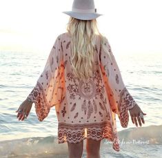 Dreamy fluttering printed details adorn this gorgeous duster. Designed with a dusty pink base, boho skull & feather print, and soft fitting design. Open front with soft draped kimono sleeves. Perfect paired with distressed shorts and sandals for spring & summer. Custom made to order. Please allow 2 weeks for production. Color: Dusty pink 100% polyester Imported Hand wash cold split Small Bust Open Waist Open Hips Open Length 30 Bust, waist, and hip measurements are a total circumference. Geometric Kimono, Boho Kimono Cardigan, Beach Wrap Dress, Summer Chiffon Blouse, Chiffon Kimono Cardigan, Gilet Kimono, Hippie Mode, Loose Kimono, Festival Mode