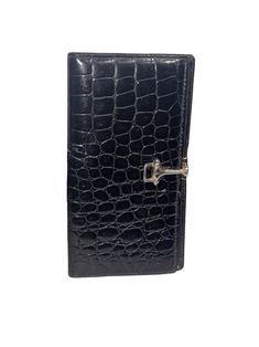 Beautiful Budd Leather Croco Bidente Checkbook Cover with Clip, black Spanish Crocodile Bidente Checkbook cover with clip closure. Keep your checks dry and unwrinkled. Made in Spain. One Size Some wear Good Condition Retails $160 Form Factor- Bi-Fold Pattern - Animal Print Color- black Closure Type- Clip Lining Description- Leather Material Type- Leather Checkbook Cover, Pattern Animal, Leather Material, Women's Accessories, Checks, Animal Print, Shoe Accessories, Spain, Women Accessories