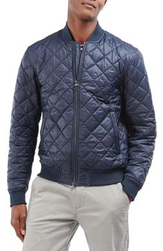 Diamond-quilted construction means reliable warmth in a ruggedly handsome jacket with outdoorsy appeal. Two-way front-zip closure Blade collar Ribbed cuffs and hem Plaid lining, with fill 100% nylon Machine wash, tumble dry Imported Quilted Jacket Men, Barbour Mens, Man Quilt, Quilt Jacket, Mens Navy, Mens Outerwear, Quilted Jacket, Outerwear Jackets, Vest Jacket