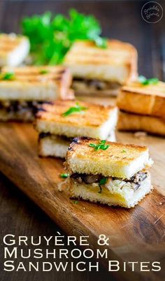 grilled cheese and mushroom sandwich bites on a cutting board with text overlay that reads, gruyere & mushroom sandwich bites