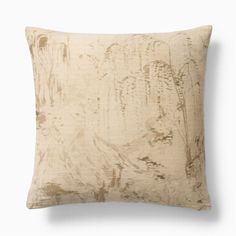 a white pillow with an abstract design on it's back and the front is made out of linen