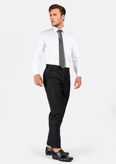 The Black Sharkskin pants provide a standout appearance. Woven with a black sharkskin weave for a subtle shine, feel sharp and distinguished in these premium custom made pants. Professional Black Pants For Business Casual, Modern Formal Long Bottoms, Modern Formal Long Pants, Black Professional Pants For Formal Occasions, Black Professional Formal Pants, Black Formal Professional Pants, Classic Black Slim Fit Pants, Sleek Leather Pants For Business Casual, Timeless Black Straight Pants