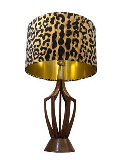 a lamp with a leopard print shade on it