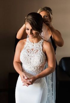 the bride is getting ready to walk down the aisle