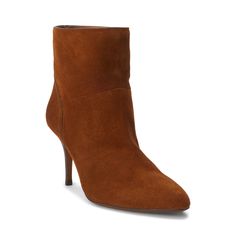 Expertly crafted in Spain with Italian sueded calfskin this versatile bootie is designed with a slender heel and slightly pointed toe. Suede Ankle Boots With 4-inch Heel, Elegant Ankle-high Suede Boots, Chic Suede Ankle Heeled Boots, Fall Suede Boots With 4-inch Heel, Chic Suede Heeled Boots With 4-inch Heel, Classic Fall Boots With 4-inch Heel, Chic Suede Boots With Suede Lining, Chic Suede Boots With Almond Toe, Fall Evening Suede Boots