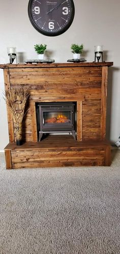 a clock mounted to the side of a wall above a fireplace