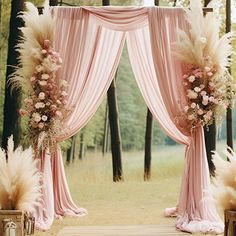 an outdoor wedding ceremony with pink drapes and pamolite flowers on the aisle