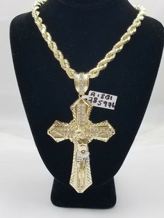 Metal:10k Gold Chain Length : 24'' Inch Weight:18-19 Grams (approx.) Width: 7mm Style: Rope Charm Weight: 9-10 Grams (approx.) Length: 2.75" (approx.) Style: Cross Weight and Width are approximate ,+/- 10% expected. We present You with This Absolutely Stunning Real 10k Yellow Gold Rope Chain with Jesus Cross Charm Pendant. It has a detailed cut with a very good finish. These Beautiful Chain and Pendant will not tarnish, discolor, or fade because they are Pure 10K Gold. Please feel free to contact us if you have any queries regarding the item.  RETURN POLICY The item has to be in its original unworn condition and should be with the tag All the accessories have to be returned along with the item There should not be any damage on the item or the item should not be customized by any other jewe Neck Chain For Men, Mens Gold Diamond Rings, Diamond Grillz, 10k Gold Chain, 21 Grams, Chain And Pendant, Gold Rope Chains, Jesus Cross, Cross Chain