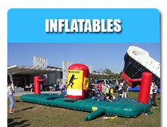 inflatables are used to play games on the lawn as well as other activities