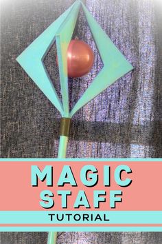 an origami flower with the words magic staff on it's front and bottom corner