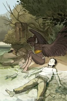 a man laying on the ground next to a bird flying over him and another person sitting in the water