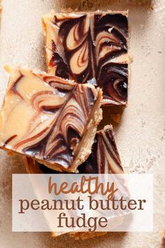 healthy peanut butter fudge bars with chocolate swirled on top and text overlay that reads, healthy peanut butter fudge