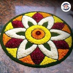 a colorful flower design is on the floor