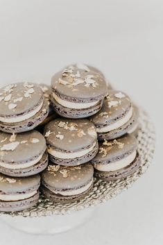 a stack of cookies sitting on top of a glass plate