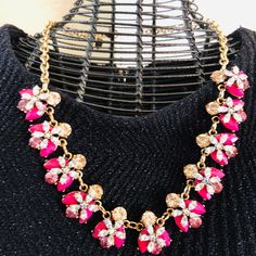 Pink Statement Necklace Will Make Any Outfit Look So Stylish! Pink Rhinestone Clavicle Chain Necklace, Pink Clavicle Chain Rhinestone Necklace, Pink Rhinestone Necklace For Party, Pink Rhinestone Costume Jewelry Necklace For Gift, Pink Rhinestone Party Necklace, Red Elegant Flower Necklace, Chic Pink Flower-shaped Jewelry, Elegant Pink Flower Necklace For Party, Elegant Pink Rhinestone Necklace With Jewels