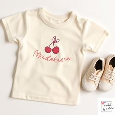 This custom name shirt is perfect for the little boy or girl in your life. Trendy, fun and simple, this shirt is the perfect custom gift.  Our unique and eye-catching shirts are crafted using the latest DTG (Direct-to-Garment) technology, ensuring high-quality prints that capture every detail of our designs. While we take immense care to maintain color accuracy in our products, it's important to remember that colors may appear slightly different on your computer monitor due to variations in display settings. The brightness, contrast, and color calibration of each screen can influence how our designs are perceived. Using the Bella + Canvas Shirts for printing CARE INSTRUCTIONS: Wash on cold, inside out, and tumble dry on low or hang dry. Do NOT iron design! // Ships in 2-3 business days // Cute Cotton T-shirt With Name Print, Personalized Pink T-shirt For Summer, Family Matching Cotton Shirt For Playtime, Family Matching Custom Name Cotton T-shirt, Cute Tops With Name Print For First Birthday, Cute Top With Name Print For First Birthday, Custom Name Cotton T-shirt For Family Matching, Personalized Summer T-shirt For Gift, Family Matching Cotton T-shirt With Custom Name