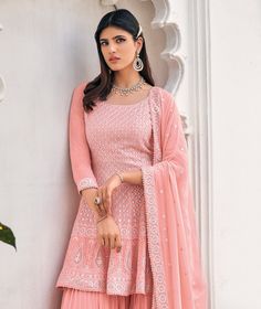 COLOR : Light Salmon Pink FABRIC : Top & Bottom - Viscose Georgette, Inner - Santoon, Dupatta - Net, Nazmin WORK : Resham Embroidery, Silver Thread Work, Sequins, Motifs, Lace Border OCCASION : Wedding, Reception, Party Wear, Sangeet, Engagement, Festival READY-TO-WEAR : No STITCHING : Available as semi-stitched fabric, can be stitched using standard size option (+$20). Note: There might be a slight color variation due to lighting and flash used during photoshoot. The bright shade seen is the be Sharara Suit Wedding, Pink Sharara Suit, Pink Sharara, Bridal Anarkali, Gharara Suits, Party Sarees, Light Salmon, Palazzo Suit, Sharara Suit