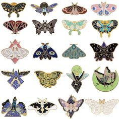 a bunch of different types of butterfly pins on a white background with the same color and pattern