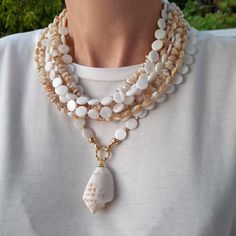 Cheap White Mother Of Pearl Necklaces, Handmade Long White Necklace, Elegant Long White Shell Necklace, Elegant White Long Shell Necklace, White Multi-strand Jewelry With Natural Stones, White Beaded Mother Of Pearl Necklace, Handmade White Mother Of Pearl Beaded Necklaces, White Mother Of Pearl Round Bead Necklaces, Elegant Beaded Necklaces With Gemstone Beads, Mother Of Pearl