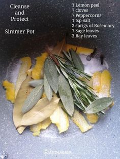 the ingredients to make an orange peel recipe are shown in a bowl with leaves and lemons