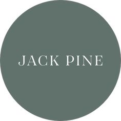 the word jackpine in white on a green circle with black and white lettering underneath it