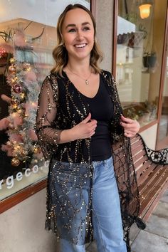 Blonde girl wearing a black and gold sequin kimono over a black tank top with light denim jeans. Sequin Kimono Outfit, The Dalles Oregon, Rhinestone Jacket, Sequin Kimono, Kimono Outfit, Criss Cross Sandals, Bohemian Women, Columbia River Gorge, Columbia River