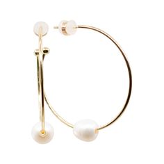 Staples of class and sophistication, our Alley round hoop earrings are beautiful in every light. Decked with a white freshwater pearl that complements your every look, you'll be gleaming like the sun all day long. Each piece of jewelry created by The Freshwater Pearl Company features genuine freshwater cultured pearls. Our collections are proudly designed in Palm Springs and distributed in the U.S. from our San Diego studio for a touch of California coastal style. Pearl Type Freshwater Pearl Siz Everyday Round Pearl Jewelry, Everyday Pearl Drop Earrings, White Round Jewelry For Everyday Elegance, Elegant Circle Pearl Jewelry, Elegant Circular Pearl Jewelry, Elegant Pearl Circle Jewelry, Elegant Pearl Jewelry In Circle Shape, Small Hoop Pearl Earrings, Modern Round Pearl Earrings With Pearl Charm