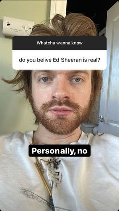 a man with long hair and beard wearing a t - shirt that says, do you believe ed sheran is real?