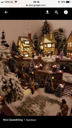 a small christmas village is shown in this image