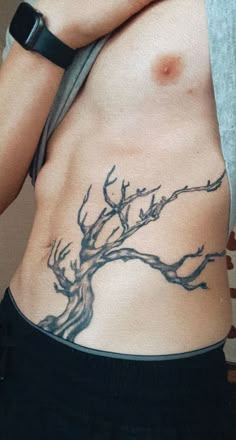 This tattoo is a tree. Stomach area, grunge/bad boy type of vibe. Male Chest Tattoos Ideas Men, Men Rib Tattoo Ideas, Men Rib Tattoo, Rib Cage Tattoo Ideas, Cage Tattoo Ideas, Mens Side Tattoos, Rib Tattoo Ideas, Rib Cage Tattoo, Personal Tattoos