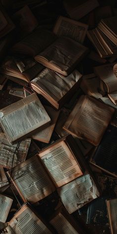 many old books are scattered on the floor