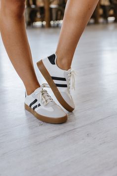 Stride in style with our Striped Lace Up Flat Sneakers! These trendy and comfortable sneakers feature a striped design and lace-up closure, perfect for adding a touch of flair to any outfit. You'll love the combination of fashion and functionality in these must-have shoes! Size Chart (INCH) Sizes Foot Length 6(37) 9.3 7(38) 9.4 8(39) 9.6 8.5(40) 9.8 9.5(41) 10.0 10(42) 10.2 Comfortable Sneakers, Flat Sneakers, Lace Up Flat, Hat Hairstyles, Sneakers White, Stripes Design, Black Stripes, Step Up, Clothes For Sale