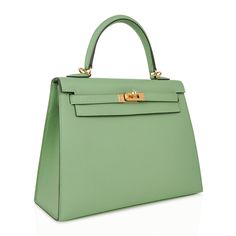 Guaranteed authentic Hermes Kelly Sellier 25 bag featured in fresh Vert Criquet. Stunning Hermes light green that is absolutely neutral. Luxurious with gold hardware. Comes with signature Hermes box, raincoat, shoulder strap, sleepers, lock, keys and clochette. NEW or NEVER WORNThe Hermes Kelly Sellier 25cm bag price retains its value due to the rarity and high demand. As a purveyor of exceptional and unique Hermes luxury goods, mightychic raises the bar of online shopping.final sale BAG MEASURE Luxury Green Tote Satchel, Classic Green Bag With Detachable Handle, Green Luxury Satchel For Daily Use, Elegant Green Bag With Top Carry Handle, Luxury Green Satchel, Timeless Green Office Bag, Classic Green Bag With Detachable Strap, Luxury Green Satchel With Double Handle, Classic Green Bag With Top Carry Handle