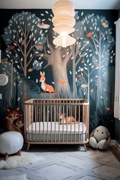 a baby's room with a forest mural and crib