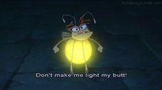 a cartoon character that is standing in the dark with a glowing light on his chest