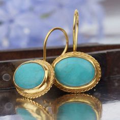 Handmade Turkish Artisan Classic & Elegant Turquoise Earrings Women Jewelry By Makeitbylove. The length of these Beautiful earrings is 26 mm, the Width 18 mm .  Weight 6.35 grThe metal used in the earrings is 925 k sterling silver and 24 k Pure Yellow Gold Plated.  The same design is available as completely silver color (without plating) and also in different color gemstones.   Please Check My Other Designs and contact me if you have questions or Requests. I offer Complimentary Ring Sizing. Custom Orders Are Welcome.